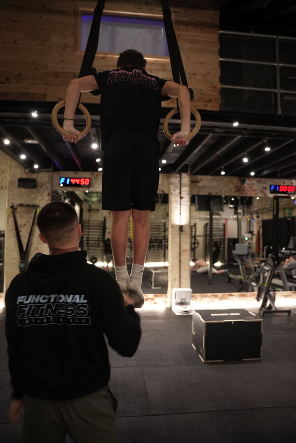 Rings coaching session — youth calisthenics at Farnham gym